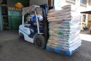 a forklift moving pet food